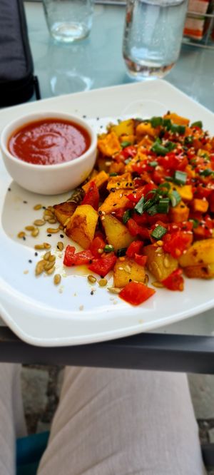 Rosti with tofu and tomato sauce at BIOFresh in Timisoara