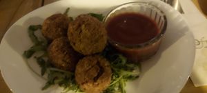 Vegetable balls with tomato sauce at BIOFresh in Timisoara