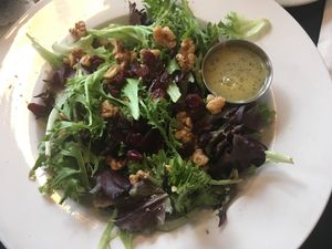 Chophouse Salad with Goat cheese and ranch dressing removed, subbed orange poppyseed vinaigrette  at Trellis Cafe in Hubbards