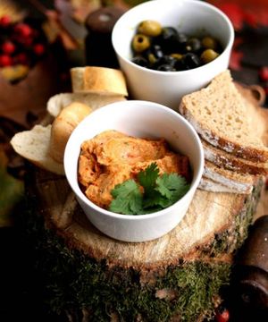 Marinated olives + bread + spreads and sauces. at Cafe Kulturalna in Warsaw