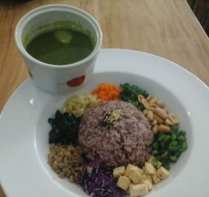 Hakka Lei Cha (Ground Tea): a tea/herbal soup served with rice and side dishes. Can be consumed by itself, or mixed with rice and side dishes to form a gruel. at My Healthy Cuisine in Sibu