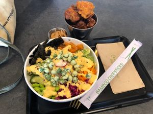 “Salmon” sushi bowl with popcorn cauliflower TO DIE FOR   at Happy Maki in Brighton