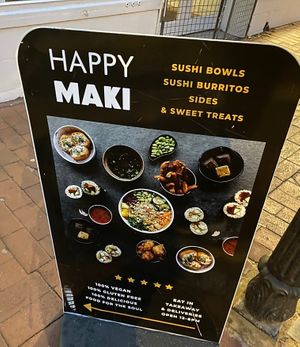 Street facing sign   at Happy Maki in Brighton