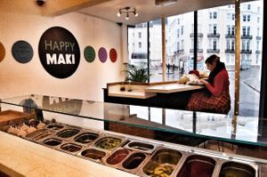 Sushi rolling bar and upstairs seating area.  at Happy Maki in Brighton