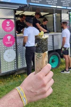 "Fully loaded" sushi burrito at the Vegan Campout 2023 at Happy Maki in Brighton