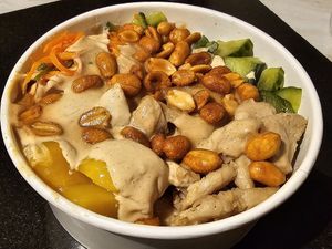 Mango chick'n satay poke bowl at Happy Maki in Brighton