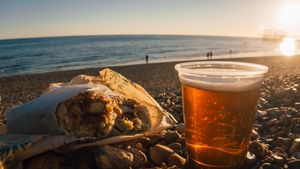 Get a roll, grab a beer and sit on the beach whilst watching the sunset. at Happy Maki in Brighton