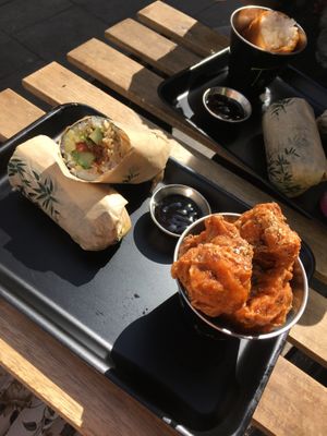 Hoisin duck sushi burrito and a side of tempura cauliflower at Happy Maki in Brighton