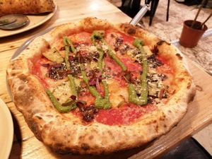 Pesto and caramelised onion pizza at Purezza in Brighton