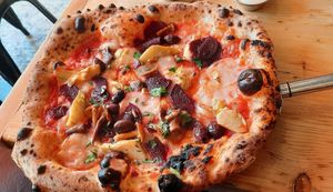 Artichokes, beetroots carpaccio, mozzarella, kalamata olived at Purezza in Brighton