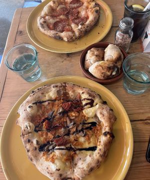 Pepperoni + Pulled Pork/Wild Mushroom/Tomato (all vegan)   at Purezza in Brighton