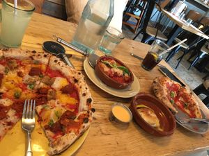 Sausage pizza, meatballs, dough balls  at Purezza in Brighton