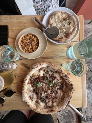 Garlic bread, macaroni cheese & mushroom & truffle pizza  at Purezza in Brighton