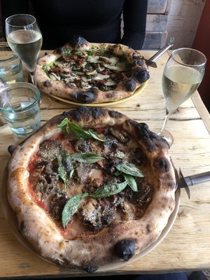 Back: the one with pesto / Front: the one with all the seasons (not sure?)  at Purezza in Brighton
