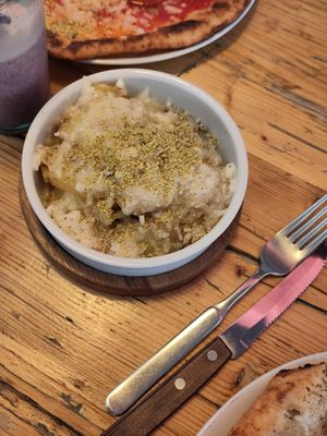 Garlic potatoes at Purezza in Brighton