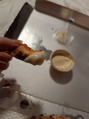 Garlic dip on crust at Purezza in Brighton