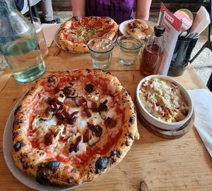 4 cheese pizza, spicy pepperoni pizza, mac and cheese, cheese stuffed dough balls at Purezza in Brighton