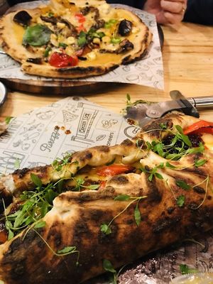 Gf pizza and calzone (bottom) at Purezza in Brighton