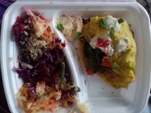 Hot cake with veggie, hummus and a lot of salad at Pomylone Gary in Lublin