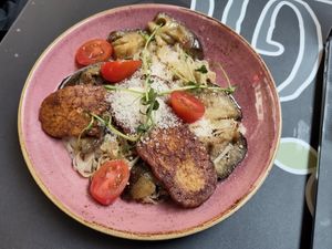 Soy tempeh with rice spaghetti and baked eggplant at Veggic in Plovdiv