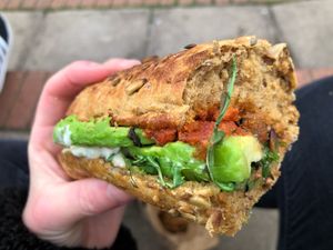 Avocado and olive tapenade toasted baguette at Chia Naturally Healthy in Hitchin