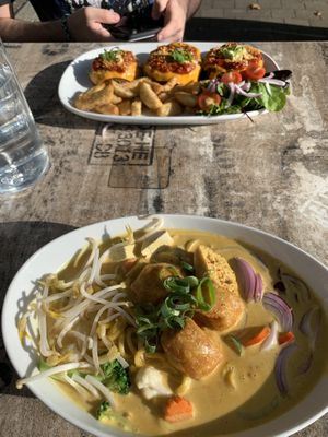 Laksa and eggplant parmigiana  at Veggo Sizzle in Adelaide