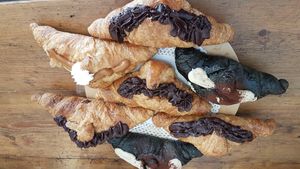 Many croissants, but you're picking the dulce de leche at La Besnéta in Barcelona