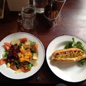 mango salad and hotdog at Vegan Hippo in London