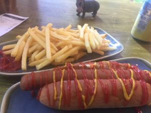 Hotdog and lots of fries at Vegan Hippo in London