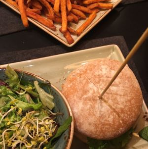 wheat burger, salad, and seeet potato chips at Hans im Glück - Isartorplatz in Munich