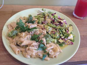 Brown rice penne in creamy broccoli sauce and mixed salad! at Organitheka in Warsaw