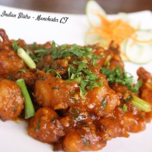 Gobi Manchurian ( #Vegan #DairyFree) - Crispy cauliflower florets tossed in mild soya garlic sauce with ginger and scallion at IndiGo Indian Bistro in Manchester