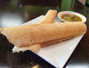 Saturday lunch buffet includes dosas (#Vegan, #GlutenFree, #DairyFree)
(Rice and lentil crepe filled w/ spiced potato) at IndiGo Indian Bistro in Manchester