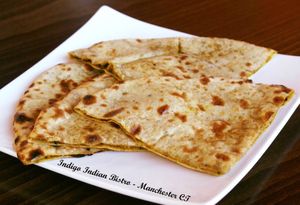 Vegan Aloo Paratha (Vegan, Dairy Free) - Whole wheat bread stuffed with spiced potatoes at IndiGo Indian Bistro in Manchester