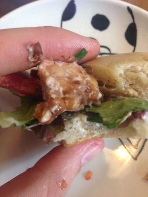 Last bites of the ";chicken"; burger -Yum! at MuYe - Mottainai in Kaohsiung