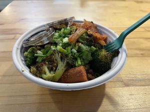 Korean Bowl- organic teriyaki tofu, organic sriracha maple carrots, organic roasted broccoli, local kimchi, homemade teriyaki sauce, green onion, sesame seeds, non-gmo white rice  at Homespun Kitchen - Previously Happy Cup in Atlantic Beach