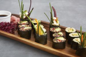 Maki rolls platter.  Maki rolls filled with red and black quinoa, avocado, peppers, enoki mushrooms, sesame seeds and micro amaranth seeds. Photo by Patricia Niven. at Redemption - Chepstow in West London