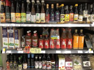 Soy-based sauces as well as two brands of coconut aminos. Also coconut oils, macadamia oil, etc. at Zenxin Organic Health Food Shop in Penang