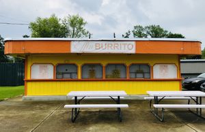 store front with outdoor seating. at Effin Burritos in Geneva