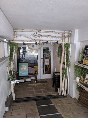 Storefront: store entrance is tucked into the building at Veganic To Go in Tokyo