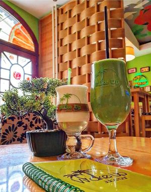 Latte Coffee with Wake Up Machine 💚 at Wake Up Juice Bar in Novi Sad