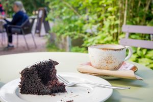 Chocolate cake and a coffee at Cafe Bar Pesula Fiskars in Fiskars
