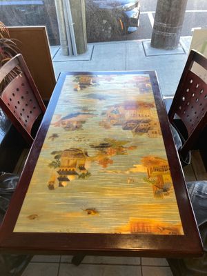 decorative table in front window for dine-in eating at China Garden  in Rye