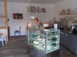 The cakes & owner in background at Einzig in Bad Vilbel