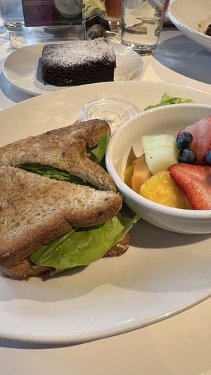 Vegan Avocado BLT with fresh fruit side and a vegan brownie  at Mustard Seed Market - Highland Sqaure in Akron