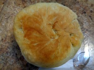 Vegan Vegetable Pillow outside.  Filled with tofu, bean thread noodles, kale, carrots, cabbage, mushrooms, onion, garlic, ginger, sesame oil. at Mustard Seed Market - Highland Sqaure in Akron