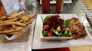 Veggie Lasagna with salad and fries at Cosmic Treats in Toronto