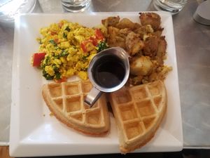 Tofu scramble, waffles, potatoes at Cosmic Treats in Toronto