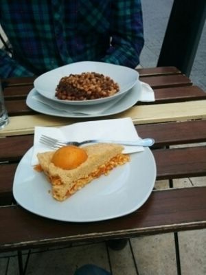 Apricot cake and the main course at CsendesM Vegan Bistro in Budapest