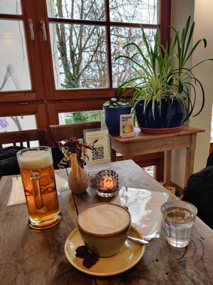 Beer and an oatmilk cappucino at Die Pause in Marburg